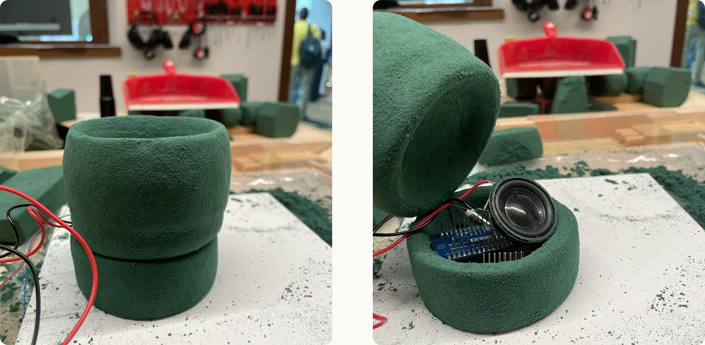 A foam model of the vessel: closed on the left, and opened on the right to show the speaker and circuit board inside